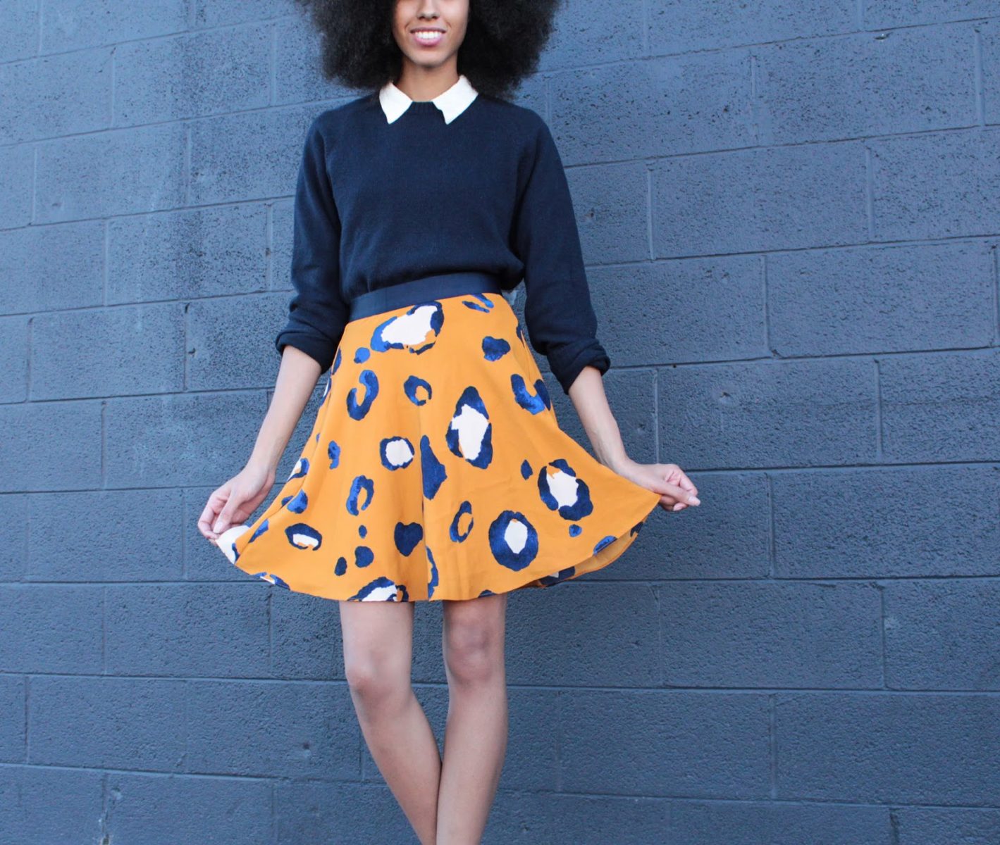 Leopard Print Skirt Styled with a Preppy Sweater